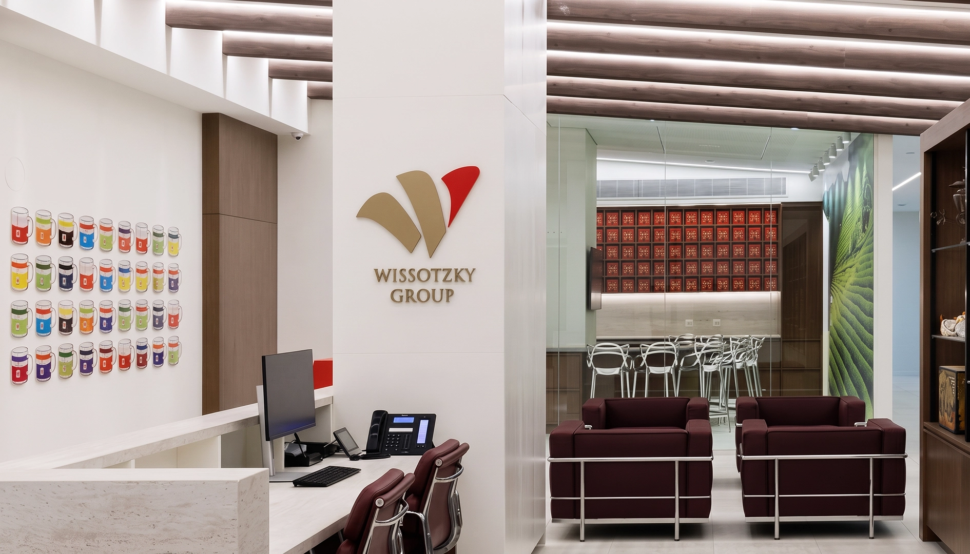 Environmental graphic design featuring 3D wall logo, custom reception signage. 3D painted acrylic wall art.