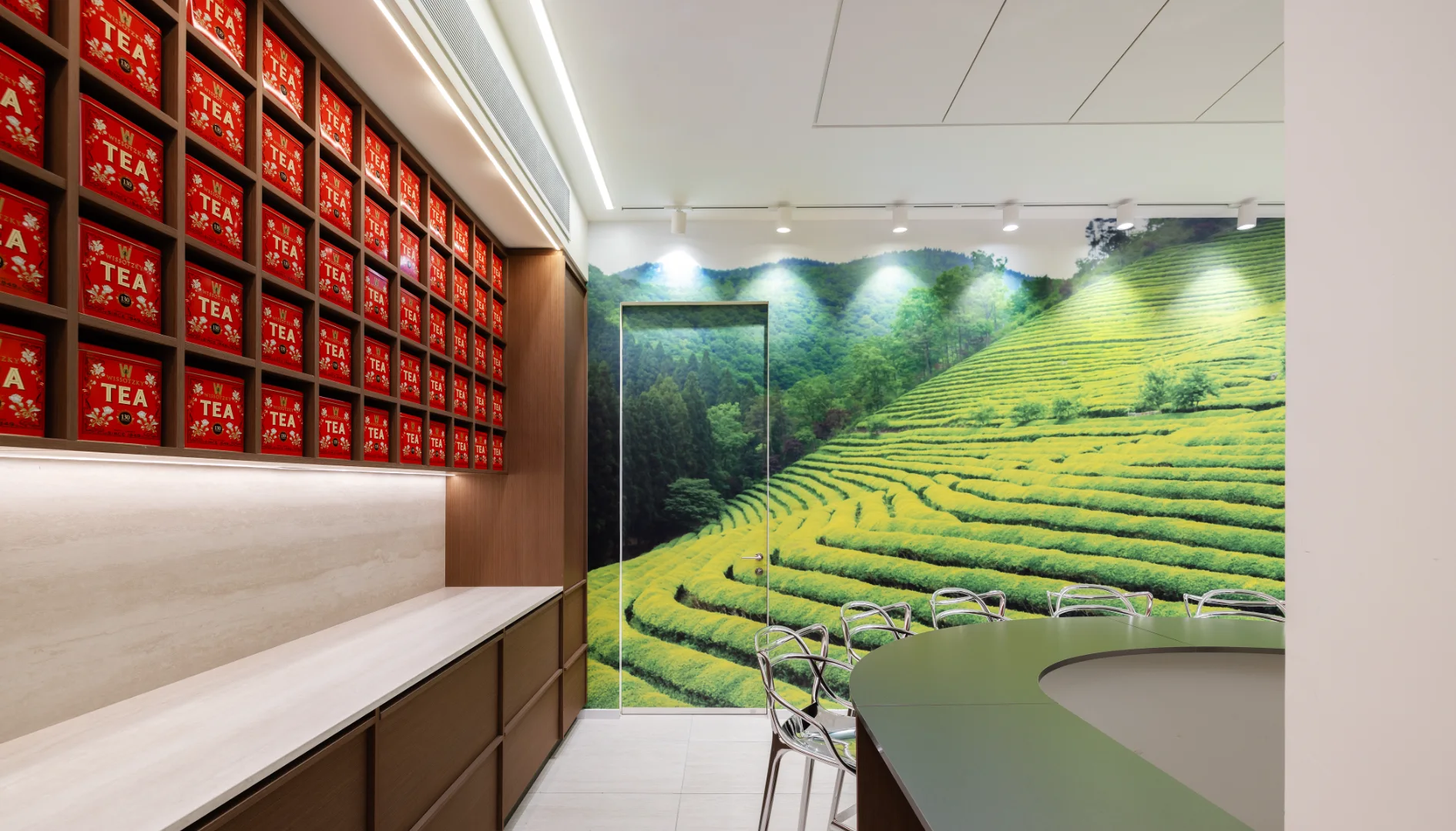 Custom printed tea field wallpaper with seamless door wrap for Wissotzky office