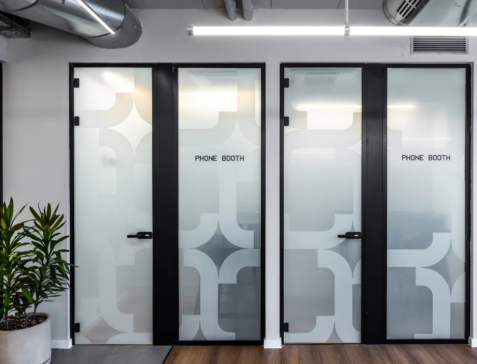 Custom gradient glass privacy film and cut vinyl office room signage